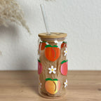 Glasbecher_Früchte_Pfirsich_mit_Strohhalm_gerade