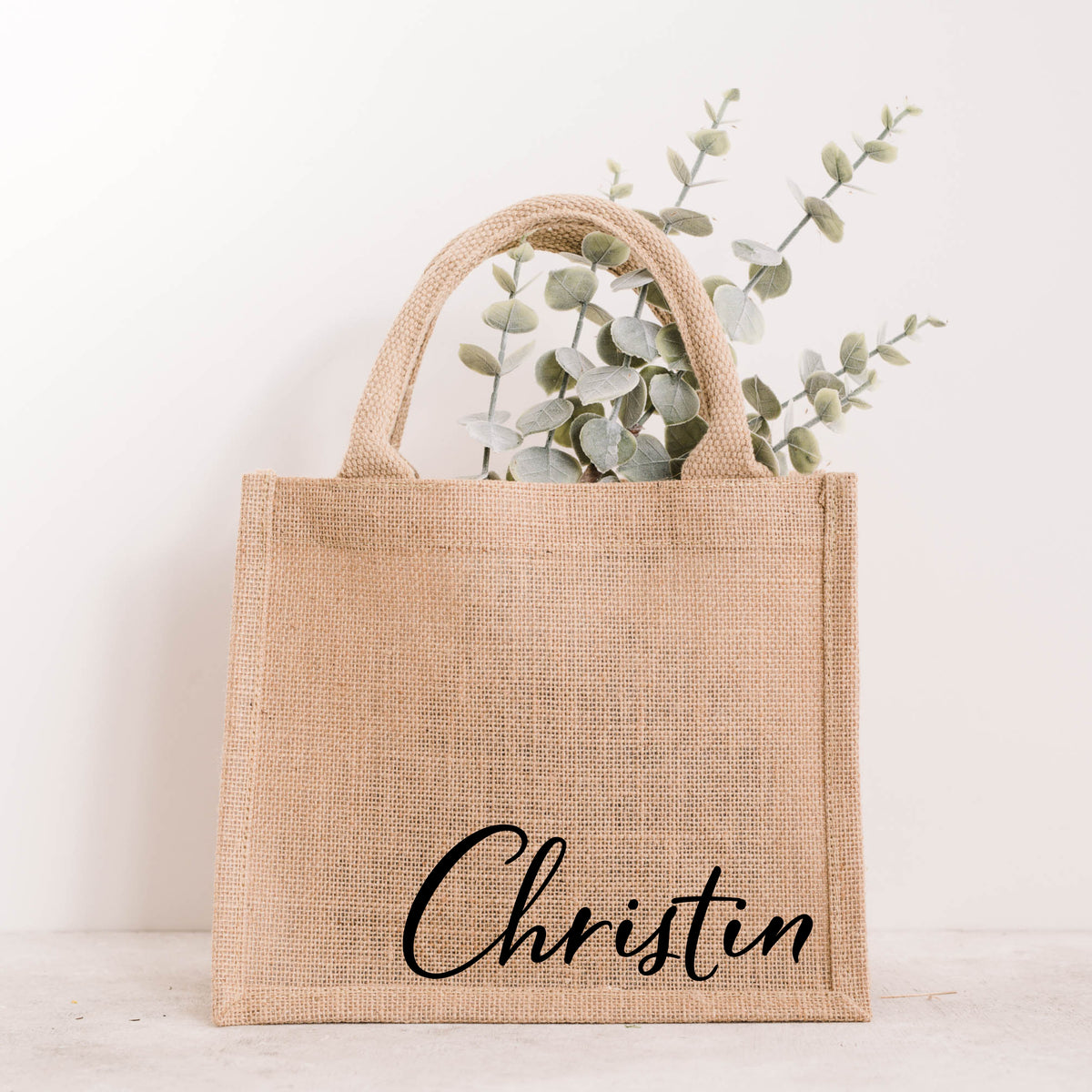 Personalisierte Jutetasche mit Namen Christin in schwarzer Schrift, Naturjute mit Henkeln, Geschenktasche von Momentwerk Studio